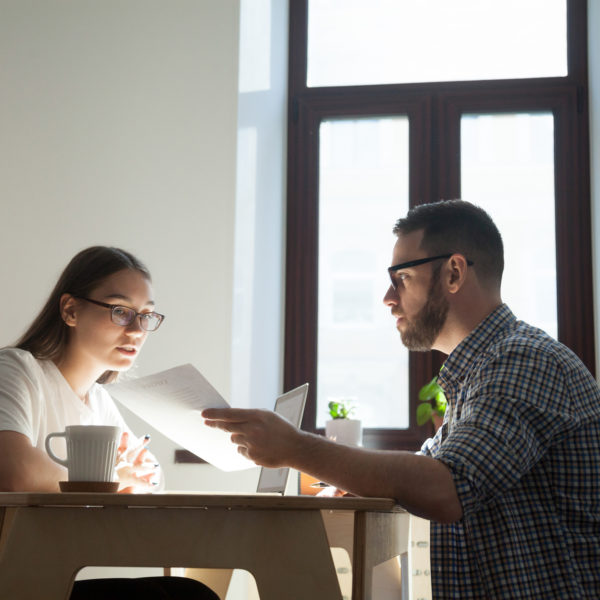 HR staff discussing a business problem at work - How to be a Good HR Professional concept