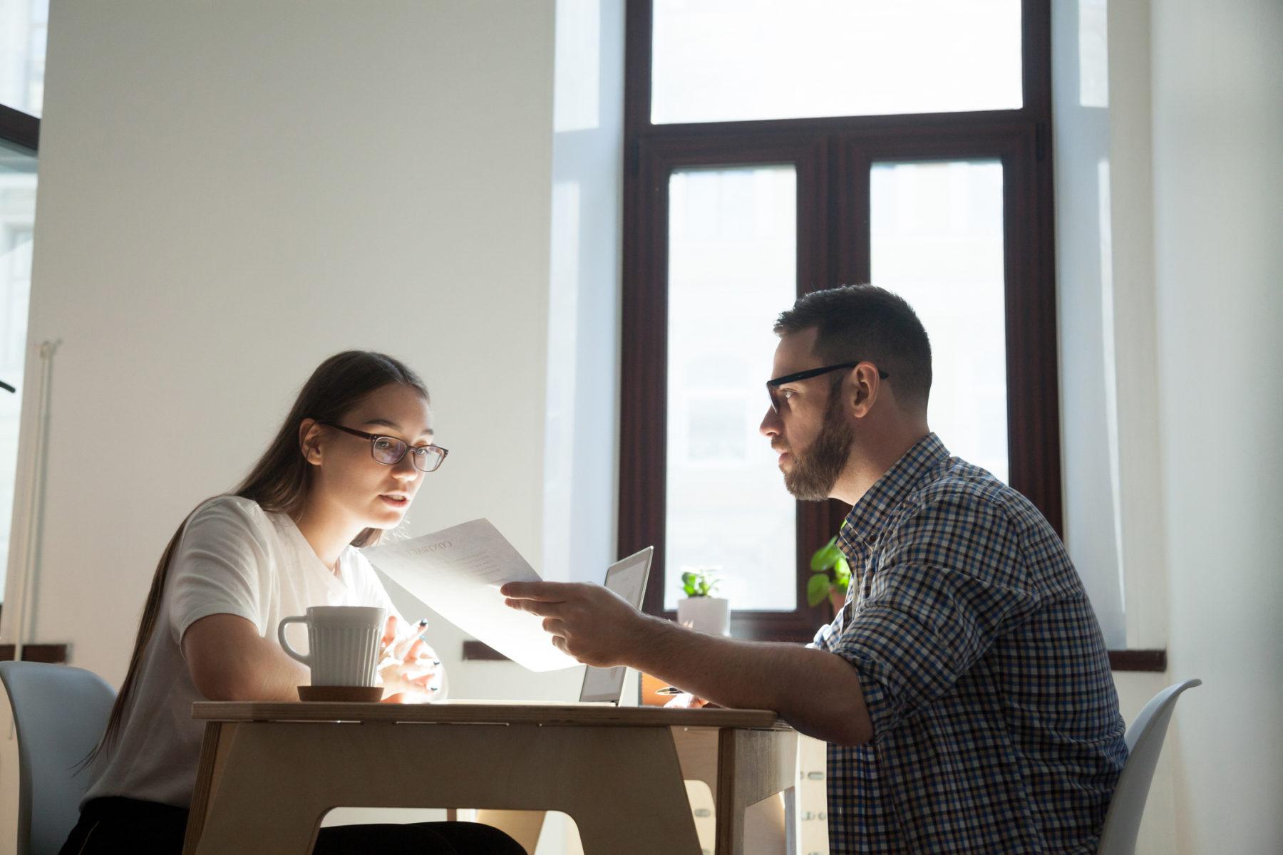 HR staff discussing a business problem at work - How to be a Good HR Professional concept