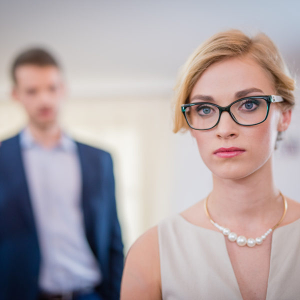 Woman being lectured by her colleague - the best ways to handle conflict in the workplace